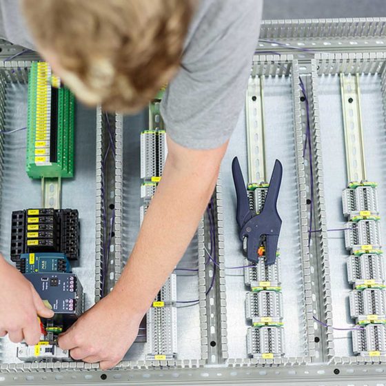 Man doing fixes to the circuit box