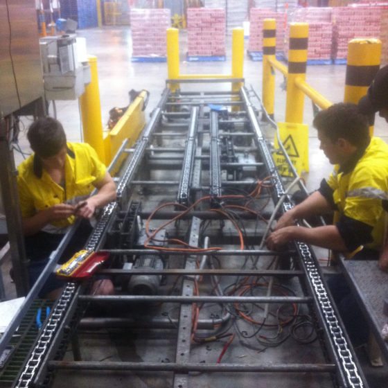 Men working on a switchboard