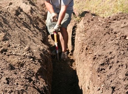 Man digging the ground