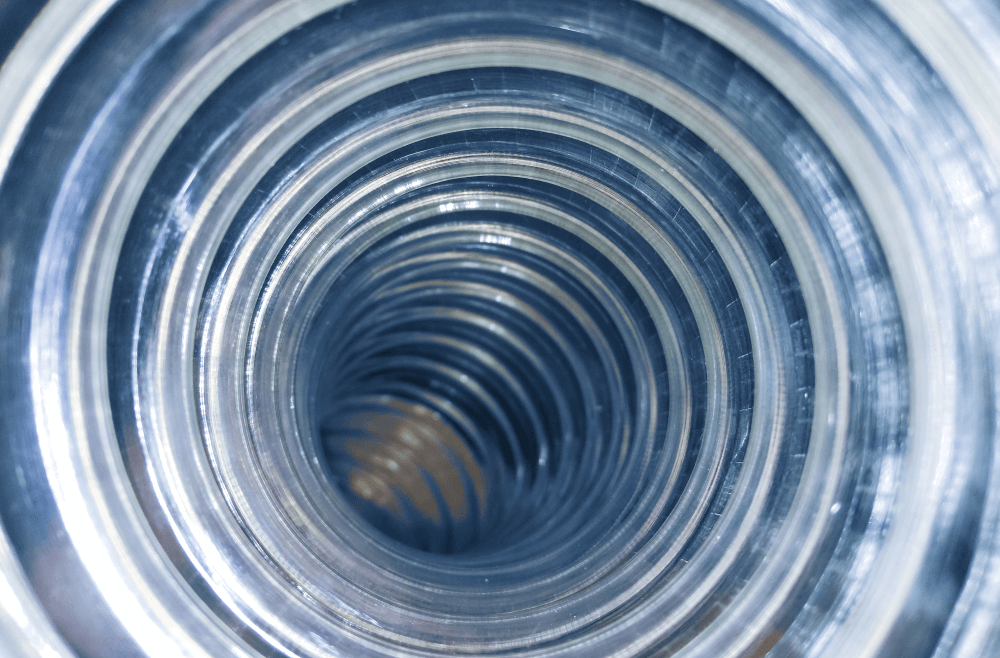 Flexi air hose, plastic flexible tube, piping on an abstract background