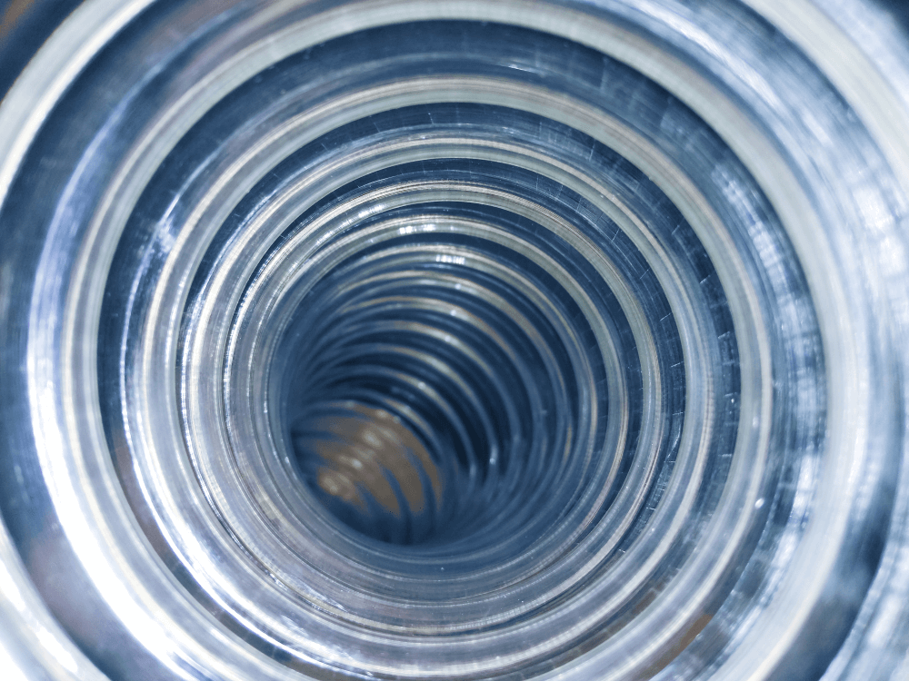 Flexi air hose, plastic flexible tube, piping on an abstract background